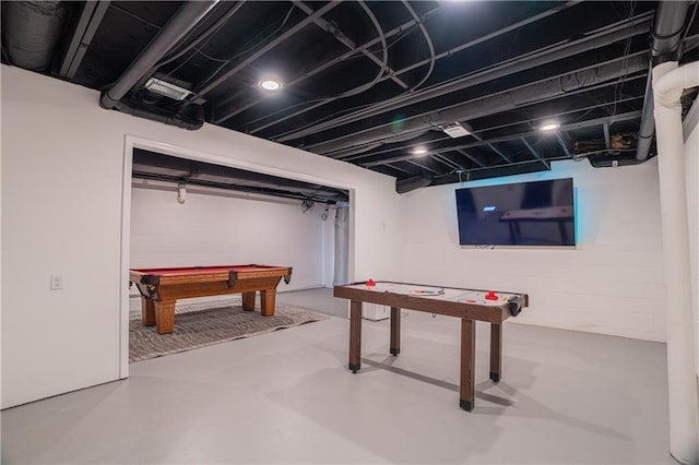 rec room featuring finished concrete flooring and pool table