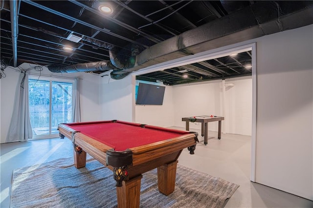 game room with concrete flooring and billiards