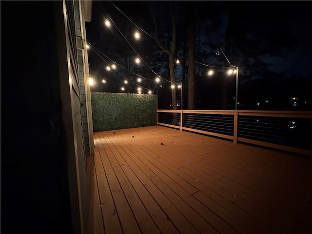 view of deck at twilight