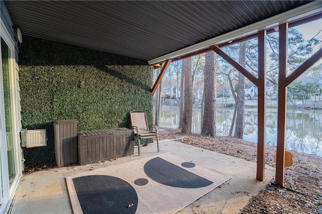 view of patio / terrace with a water view