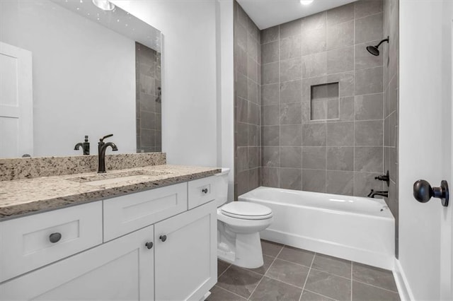 bathroom with tile patterned floors,  shower combination, vanity, and toilet