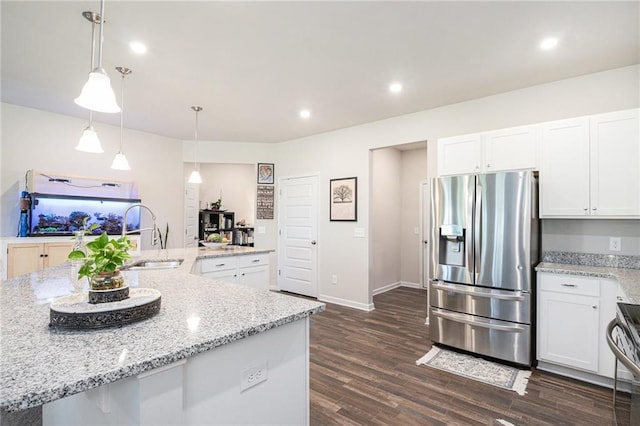 11 Rambling Oaks Dr NE, Rome, GA 30165 - kitchen with stainless steel refrigerator with ice dispenser, dark wood-style floors, light stone counters, white cabinetry, and recessed lighting