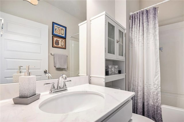 11 Rambling Oaks Dr NE, Rome, GA 30165 - bathroom featuring vanity and shower / bath combination with curtain