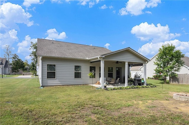 11 Rambling Oaks Dr NE, Rome, GA 30165 - back of house with a ceiling fan, a patio, an outdoor fire pit, and roof with shingles