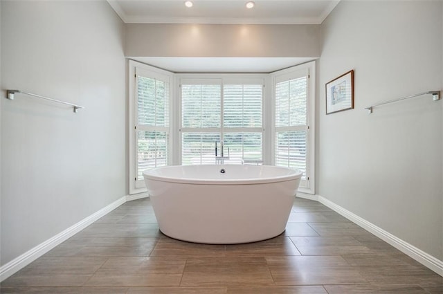 3030 Spalding Dr, Sandy Springs, GA 30350 - bathroom with a freestanding bath, crown molding, recessed lighting, and wood finished floors