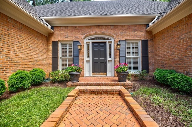 3030 Spalding Dr, Sandy Springs, GA 30350 - view of exterior entry featuring brick siding and a shingled roof
