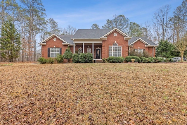 ranch-style home with a front yard