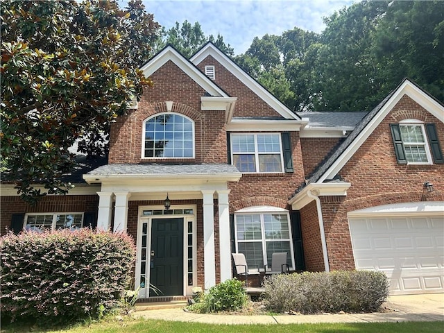 1038 Island View Ct, Buford, GA 30518 - view of front of property featuring brick siding and a porch