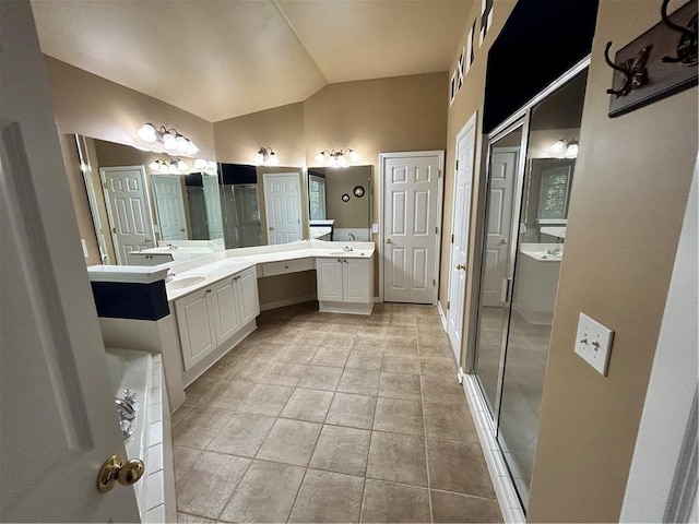 1038 Island View Ct, Buford, GA 30518 - full bath featuring lofted ceiling, two vanities, a stall shower, tile patterned floors, and a tub to relax in