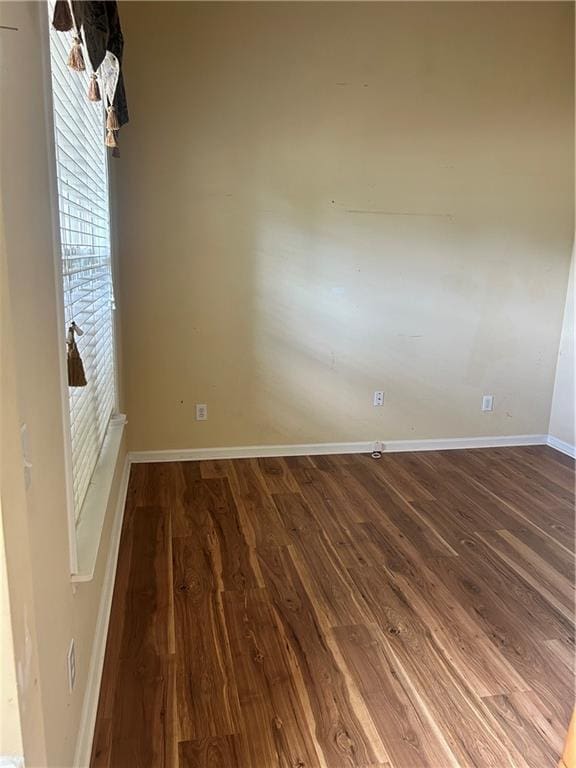 1038 Island View Ct, Buford, GA 30518 - spare room with wood finished floors