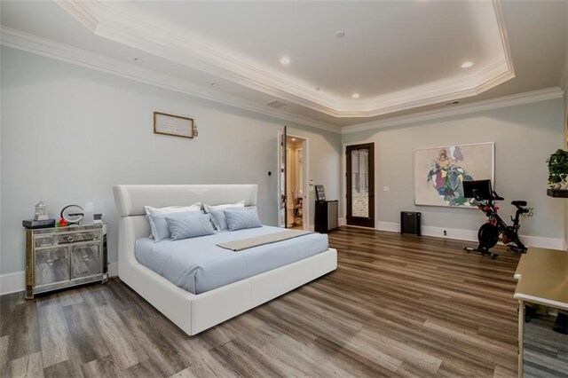 dining area with ornamental molding and dark hardwood / wood-style flooring