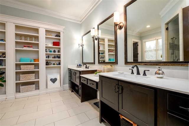 bathroom with ornamental molding, tile patterned flooring, and vanity