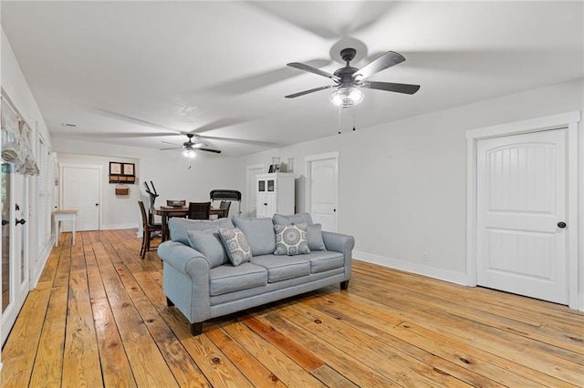 6224 Eagle Ct, Gainesville, GA 30506 - living area with ceiling fan, light wood-type flooring, and baseboards
