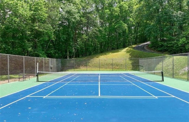 6224 Eagle Ct, Gainesville, GA 30506 - view of tennis court with a view of trees and community basketball court