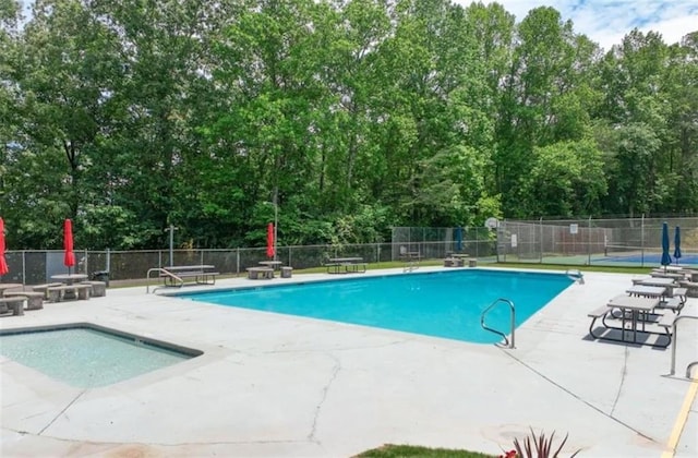 6224 Eagle Ct, Gainesville, GA 30506 - community pool with a patio and view of wooded area