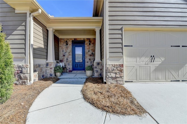 view of exterior entry featuring stone siding