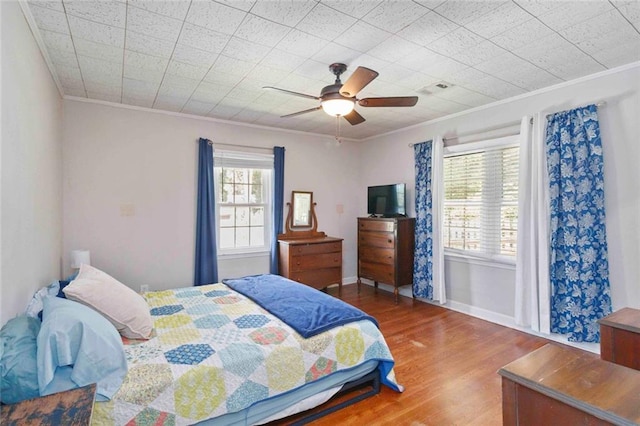 108 Buena St, Bremen, GA 30110 - bedroom with ornamental molding, wood finished floors, and a ceiling fan