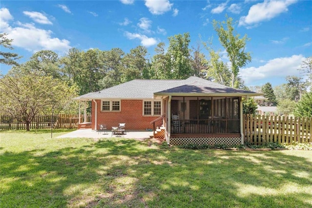108 Buena St, Bremen, GA 30110 - rear view of house featuring a patio, a sunroom, and a fenced backyard