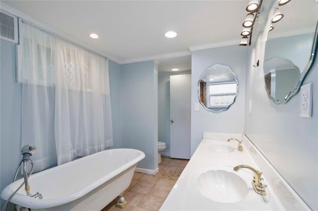 108 Buena St, Bremen, GA 30110 - bathroom featuring a freestanding tub, crown molding, double vanity, and recessed lighting