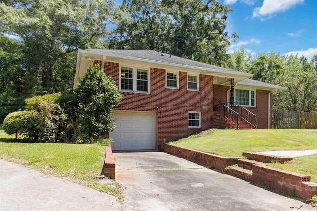 108 Buena St, Bremen, GA 30110 - view of front facade with an attached garage, driveway, and brick siding