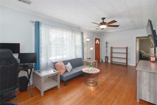 108 Buena St, Bremen, GA 30110 - living room featuring ceiling fan, a desk, and wood finished floors