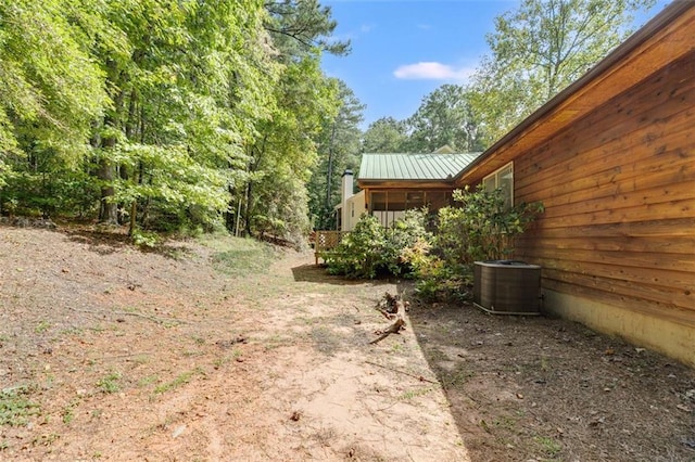 view of yard featuring central AC