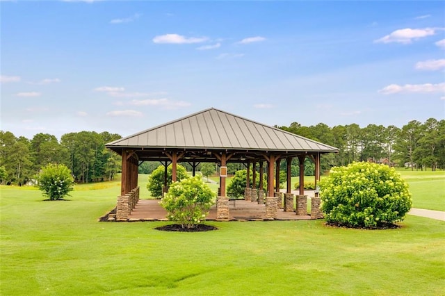 surrounding community with a yard and a gazebo