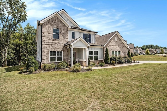 craftsman inspired home with a front yard