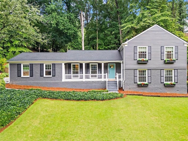 261 Lamplighter Ln SE, Marietta, GA 30067 - split level home with a porch, a front lawn, and brick siding