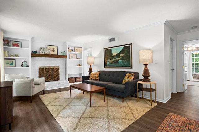 261 Lamplighter Ln SE, Marietta, GA 30067 - living area with crown molding, wood finished floors, and a brick fireplace