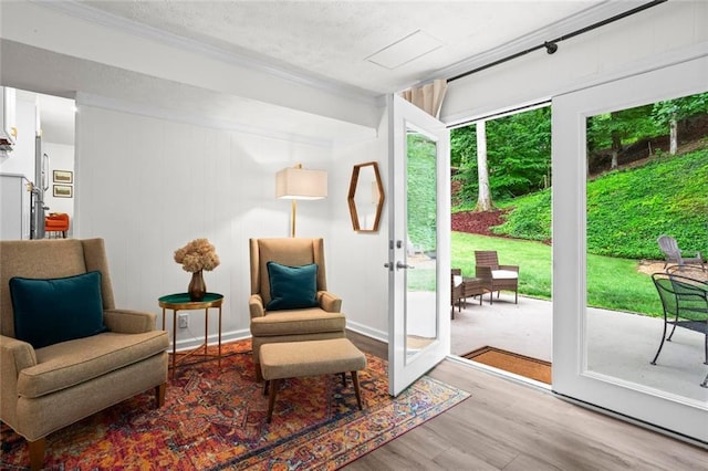261 Lamplighter Ln SE, Marietta, GA 30067 - living area featuring wood finished floors and crown molding