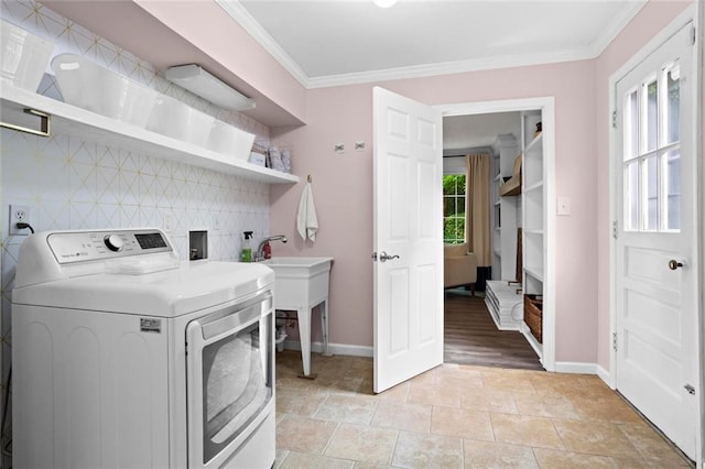261 Lamplighter Ln SE, Marietta, GA 30067 - washroom featuring washer / dryer, crown molding, and light stone finish floors