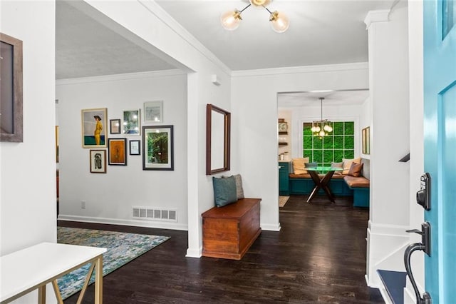 261 Lamplighter Ln SE, Marietta, GA 30067 - entrance foyer featuring a chandelier, wood finished floors, and ornamental molding