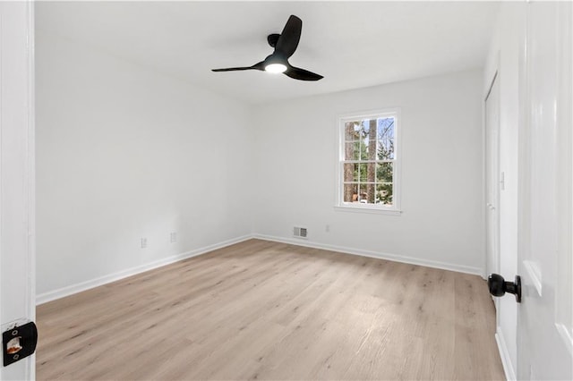 unfurnished room featuring ceiling fan and light hardwood / wood-style floors