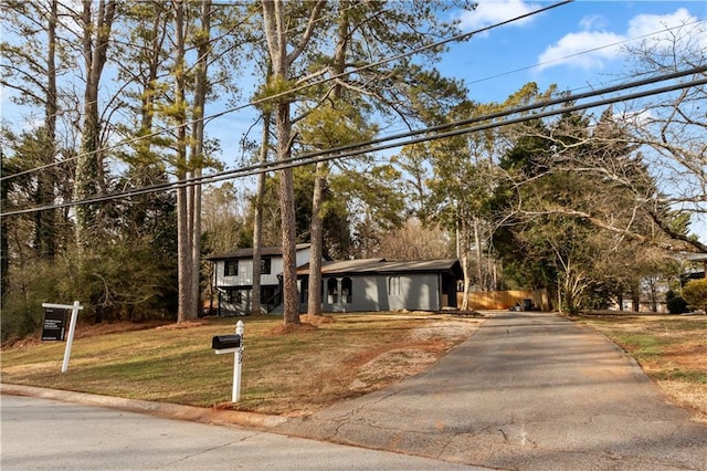 view of front of home with a front lawn