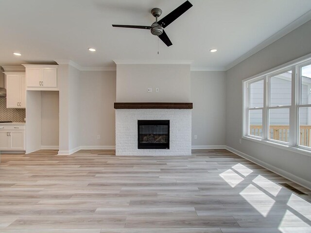 1976 Deco Dr, Kennesaw, GA 30144 - unfurnished living room with visible vents, ornamental molding, baseboards, ceiling fan, and recessed lighting