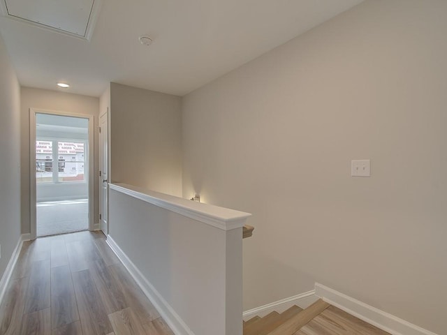 1976 Deco Dr, Kennesaw, GA 30144 - hall with baseboards, recessed lighting, wood finished floors, and an upstairs landing