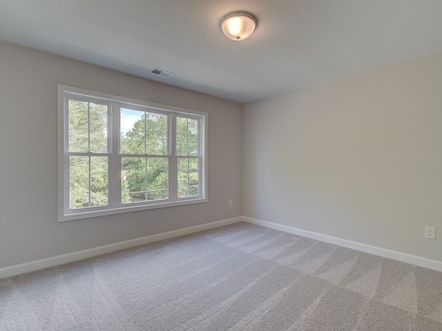 1976 Deco Dr, Kennesaw, GA 30144 - unfurnished room featuring baseboards, light carpet, and visible vents
