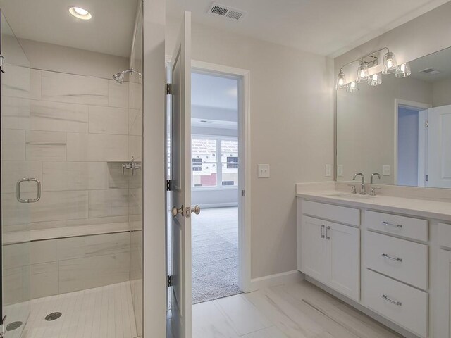 1976 Deco Dr, Kennesaw, GA 30144 - full bathroom with vanity, recessed lighting, baseboards, a shower stall, and visible vents