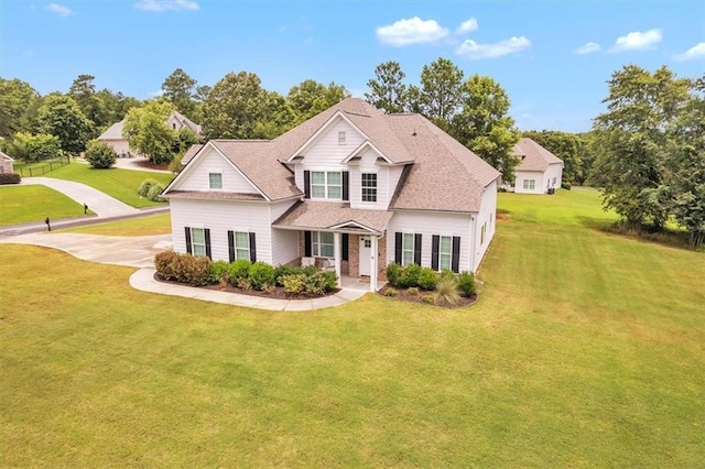 105 Lighthouse Cv SW, Adairsville, GA 30103 - traditional home with a front lawn and a shingled roof