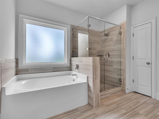 105 Lighthouse Cv SW, Adairsville, GA 30103 - full bath with a garden tub and a stall shower