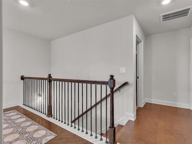 105 Lighthouse Cv SW, Adairsville, GA 30103 - hall with an upstairs landing, wood finished floors, and recessed lighting