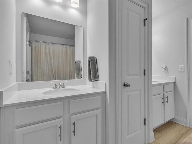 105 Lighthouse Cv SW, Adairsville, GA 30103 - bathroom featuring vanity and wood finished floors