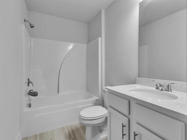 105 Lighthouse Cv SW, Adairsville, GA 30103 - bathroom featuring vanity, tub / shower combination, and wood finished floors