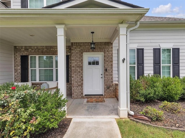 105 Lighthouse Cv SW, Adairsville, GA 30103 - property entrance with covered porch and a shingled roof