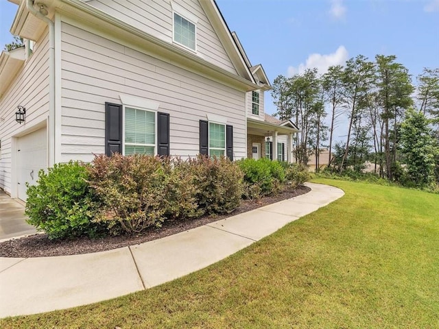 105 Lighthouse Cv SW, Adairsville, GA 30103 - view of side of home with a lawn and concrete driveway