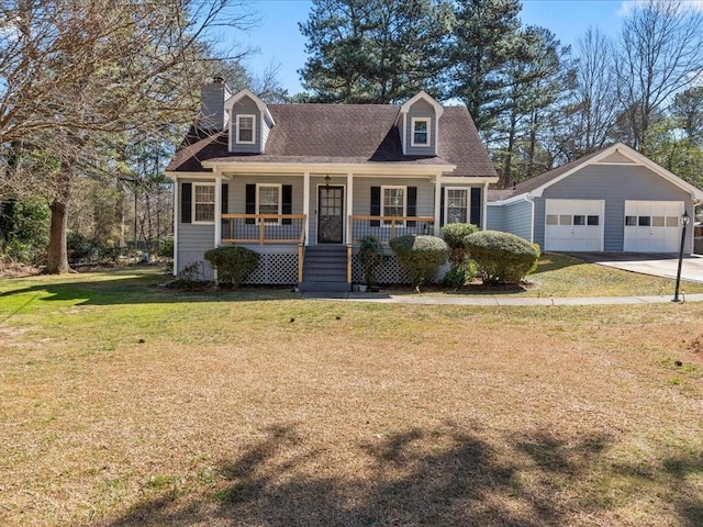 cape cod house featuring a chimney, a detached garage, a porch, an outdoor structure, and a front lawn