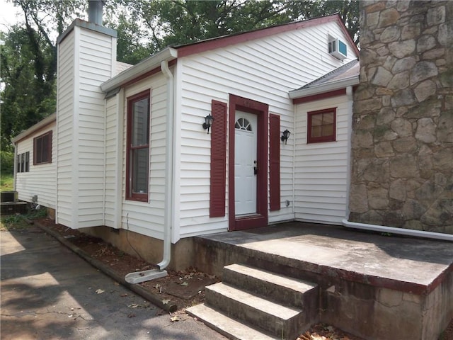 view of front of property featuring a chimney