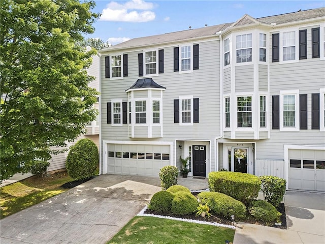 4044 Spring Cove Dr, Duluth, GA 30097 - view of property featuring a garage and driveway
