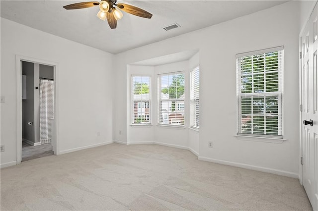 4044 Spring Cove Dr, Duluth, GA 30097 - empty room featuring a ceiling fan, light colored carpet, and baseboards